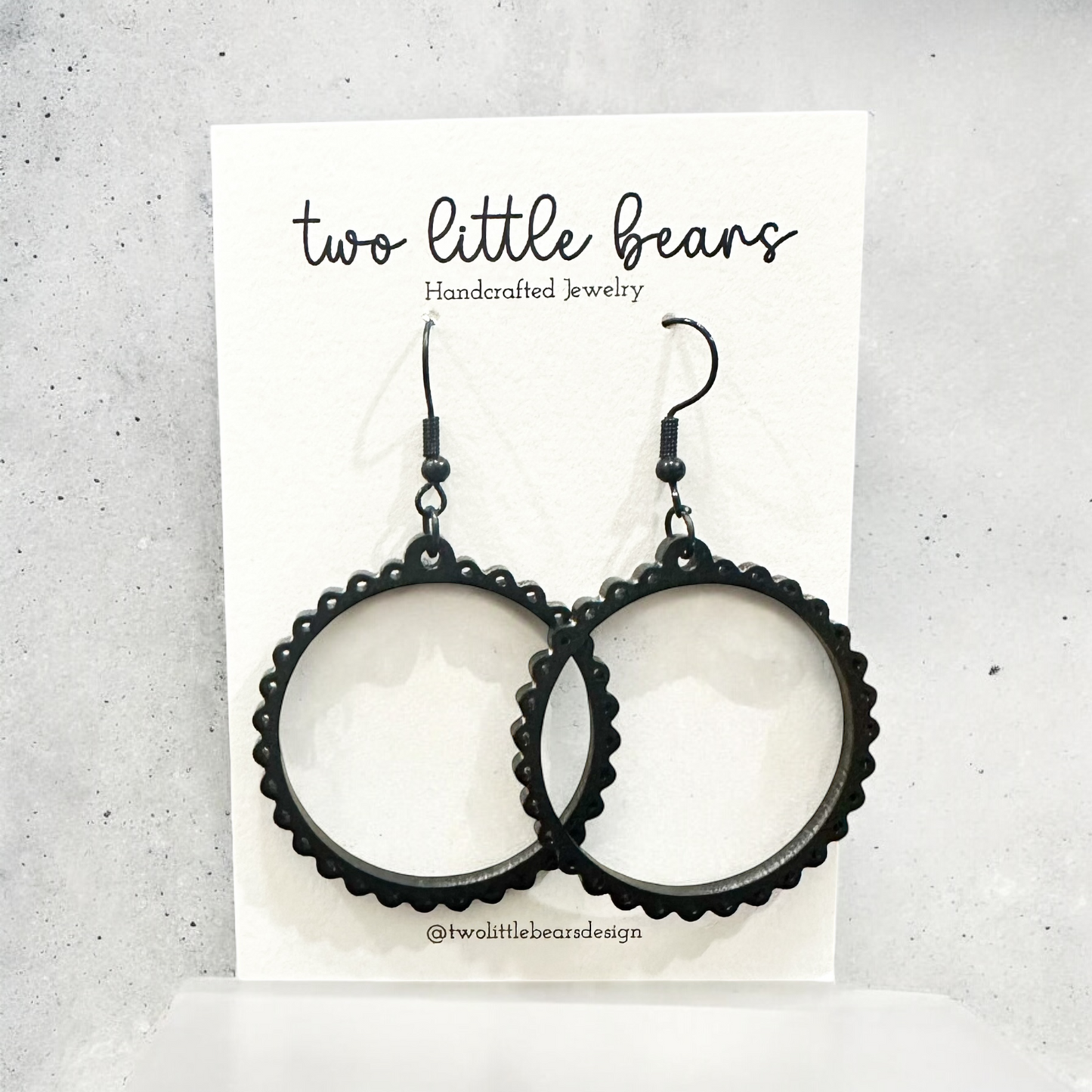 Viper Black Eyelet Acrylic Earrings