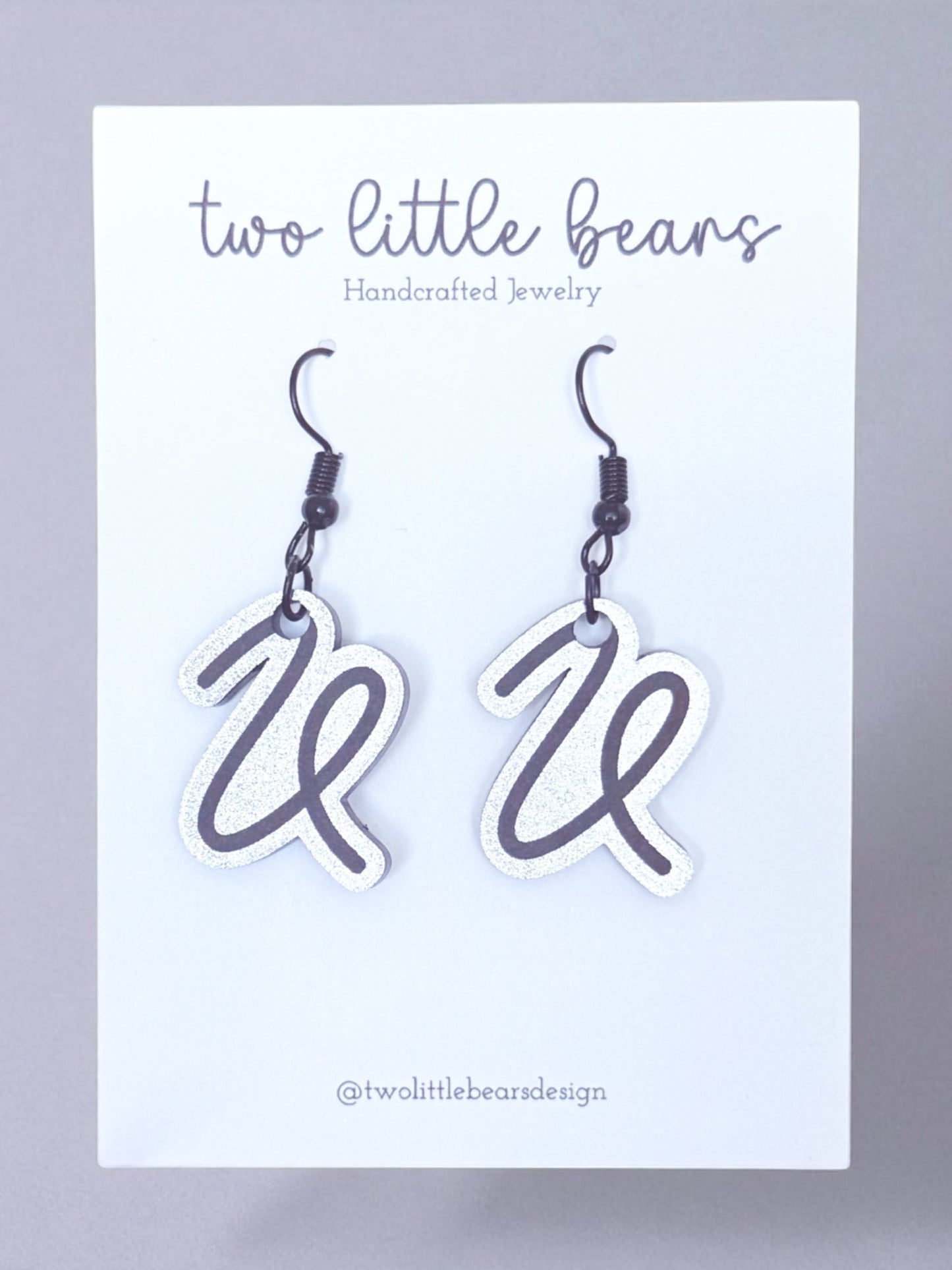 Vipers Script “V” Earrings